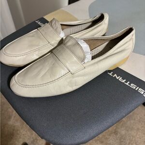 Maus & Hoffman off white leather loafers.